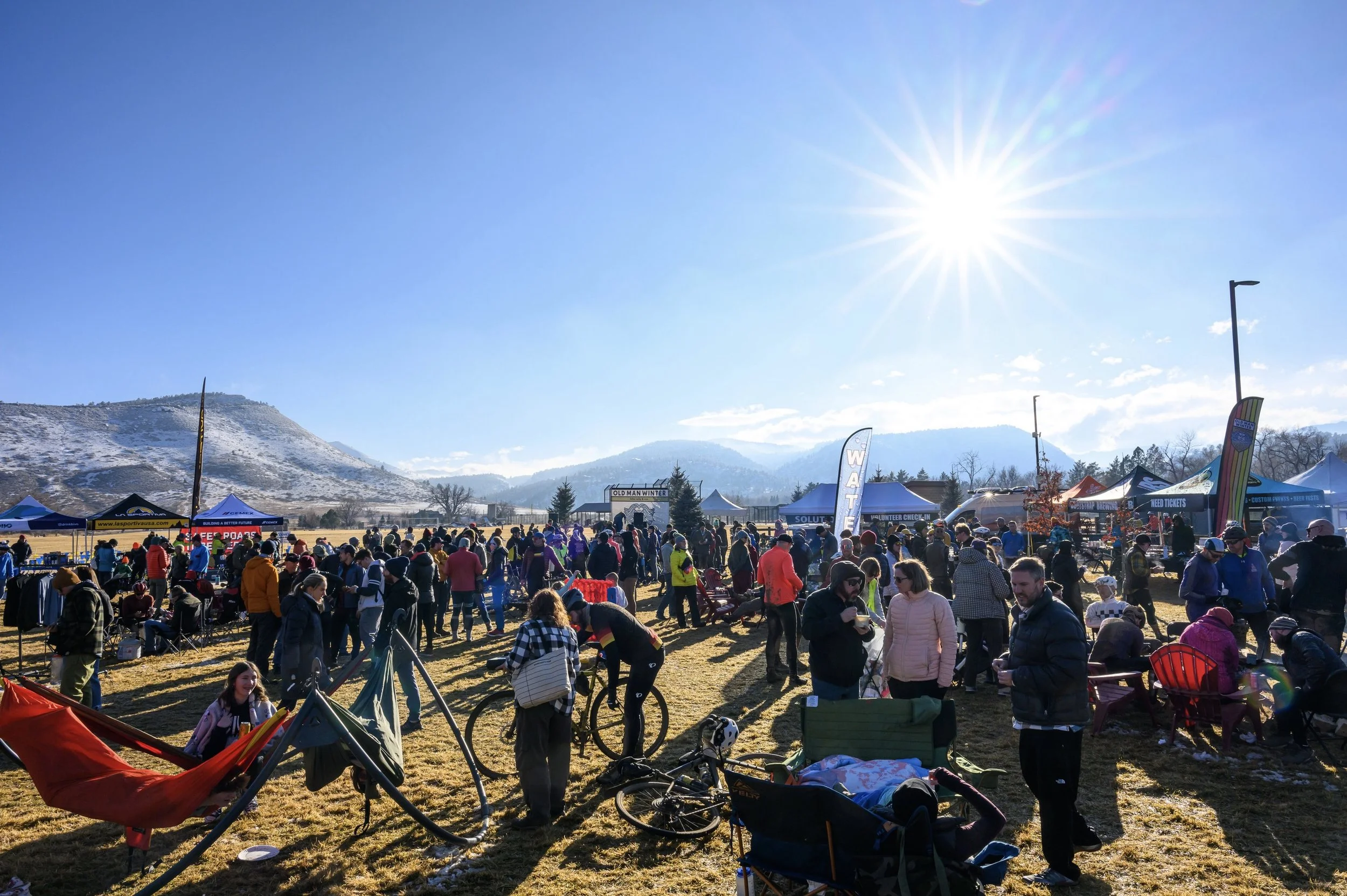 Old Man Winter participants gathering in sunny Bohn Park